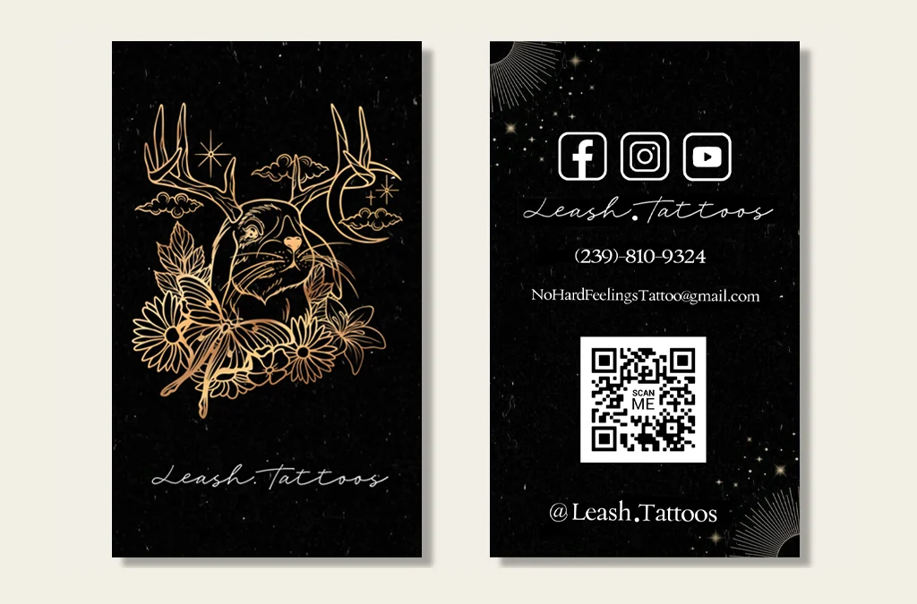 Finished Leash.Tattoos business cards featuring custom copper foil art of a rabbit with flowers and antlers, along with social media icons and a QR code for contact details.