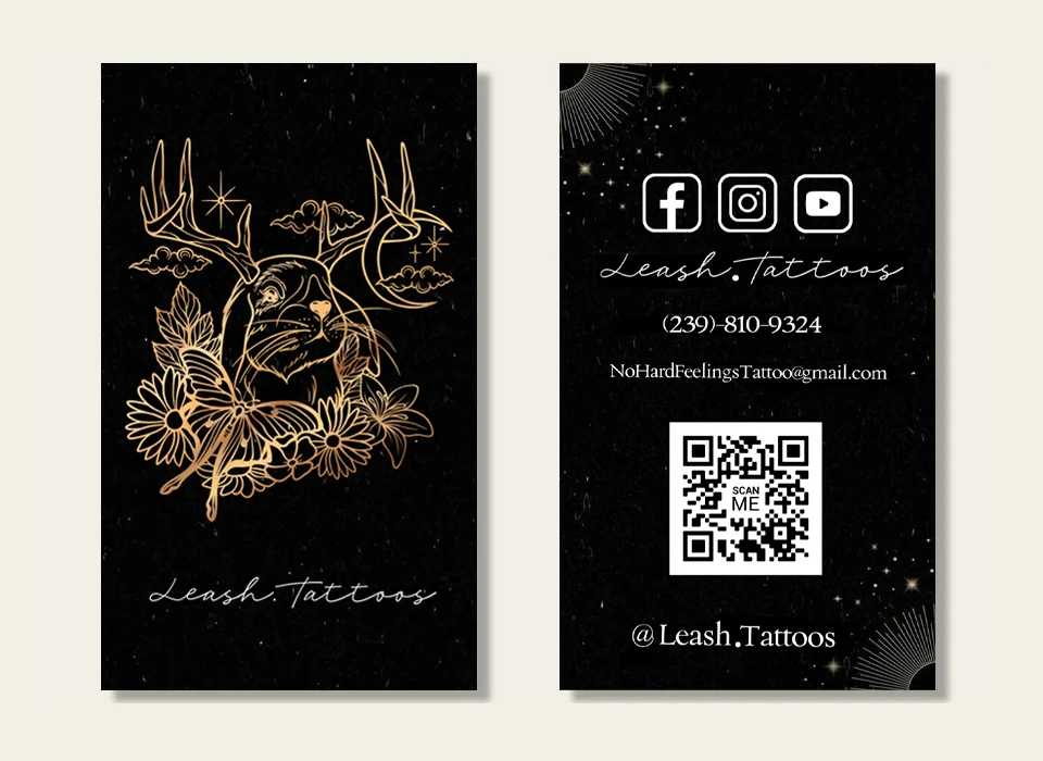 Finished Leash.Tattoos business cards featuring custom copper foil art of a rabbit with flowers and antlers, along with social media icons and a QR code for contact details.